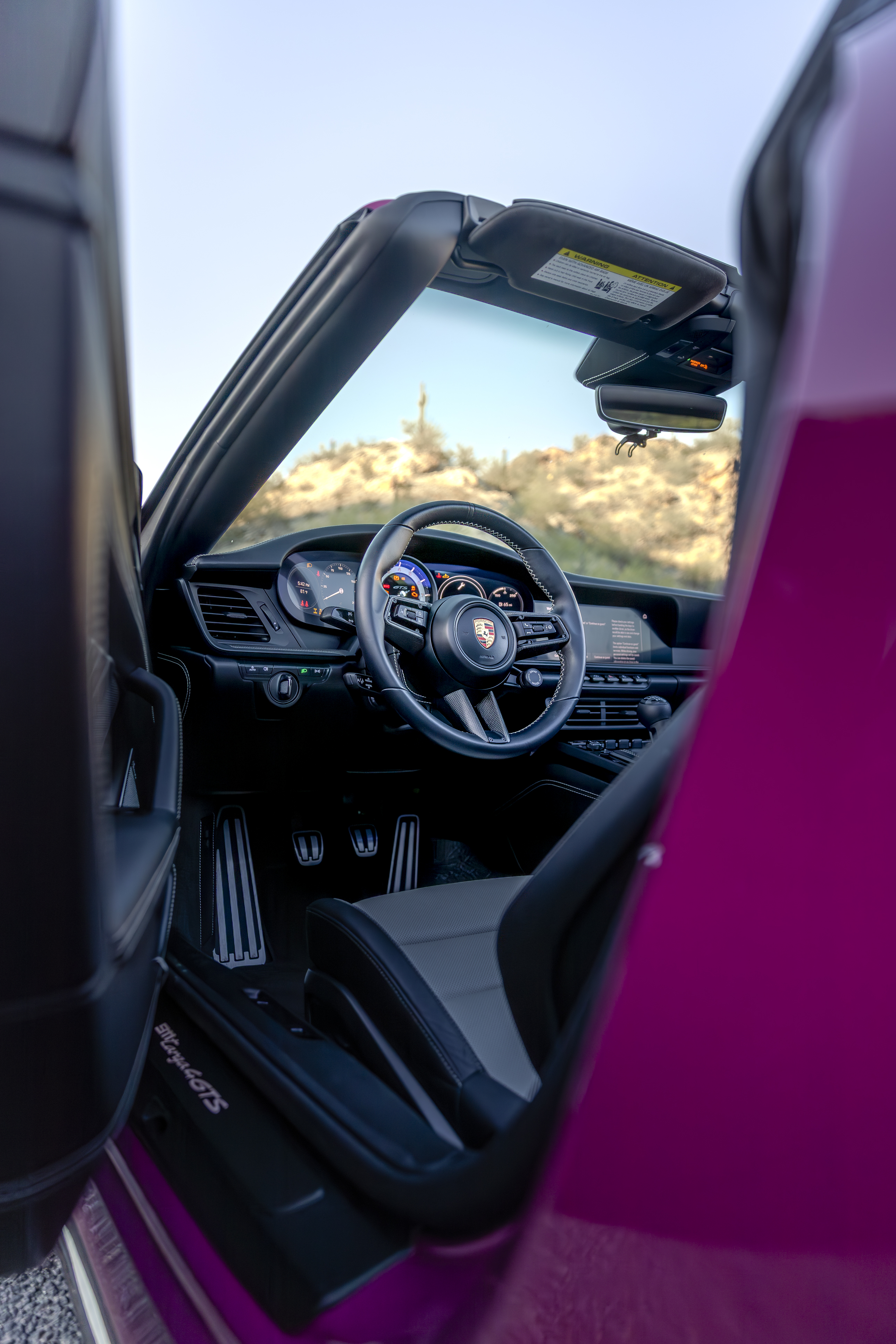 Porsche 911 Targa 4 GTS cockpit through open door